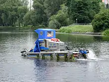 An aquatic weed harvester