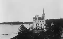 The Beacon Towers estate in 1922, showing the western elevation of the mansion.  View from the Sands Point Light to Prospect Point in the background