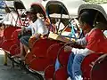 Becak lining up in Surakarta street