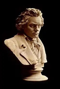 Image 1Ludwig van BeethovenPhoto: W. J. Mayer; Restoration: Lise BroerA bust of the German composer and pianist Ludwig van Beethoven (1770–1827), made from his death mask. He was a crucial figure in the transitional period between the Classical and Romantic eras in Western classical music, and remains one of the most acclaimed and influential composers of all time. Born in Bonn, of the Electorate of Cologne and a part of the Holy Roman Empire of the German Nation in present-day Germany, he moved to Vienna in his early twenties and settled there, studying with Joseph Haydn and quickly gaining a reputation as a virtuoso pianist. His hearing began to deteriorate in the late 1790s, yet he continued to compose, conduct, and perform, even after becoming completely deaf.More selected pictures