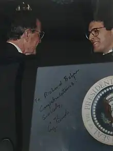 Behar congratulated by President George H. W. Bush upon receiving Worth Bingham Prize