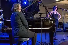 O'Hooley (seated, left) with Heidi Tidow at Musicport 2014