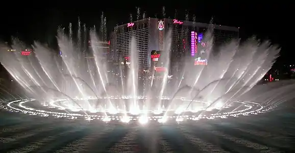 The musical fountain of the Bellagio Hotel & Casino in Las Vegas, with pivoting nozzles to vary the patterns of the water, controlled by computers and accompanied by music (1998)