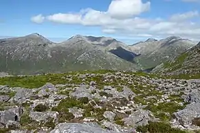 Bengower (left), Benbreen (centre), and Bencollaghduff (right), viewed Derryclare