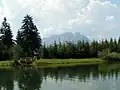 Mountain lake near the halfway station with a view of the Wilder Kaiser range