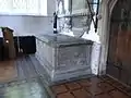 Chest tomb of Thomas de Berkeley,5th Baron Berkeley, and his wife, on top of which is the monumental brass. Not original position. Wotton-under-Edge