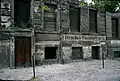 Windows and doors of apartments fronting Bernauer Straße were bricked up before they were torn down, and replaced with the Berlin Wall. The apartments were in East Berlin while their doors and windows opened into West Berlin.