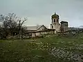 A view towards the church from the school yard