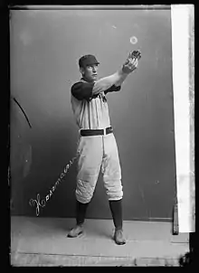 Bill Hassamaer in a Washington Senators uniform mimes catching a ball