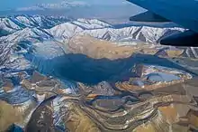 Image 14Mining has been a large industry in Utah since it was first settled. The Bingham Canyon Mine in Salt Lake County is one of the largest open pit mines in the world. (from Utah)