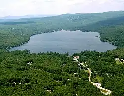 Aerial view of Elkins (foreground) and Pleasant Lake