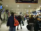 The former station concourse at rush hour