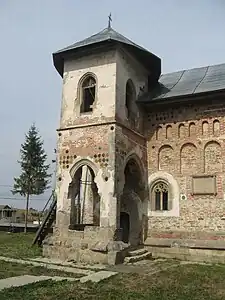 Moldavian style ceramic medallions on the facade of Biserica Sfântul Nicolae, Bălinești, Romania, unknown architect, 1494-1499