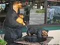 Black Bear Diner carvings with a fountain