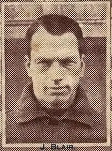 A headshot of a footballer