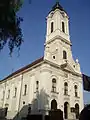 The front facade with a bell tower (1880)