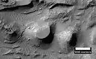 Close up of layers in eroded deposits on the floor of Bouguer Crater, as seen by HiRISE.  This image is in a different part of the crater than the previous image.