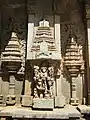 Aedicules (shikhara design) show a variety of Hindu architecture