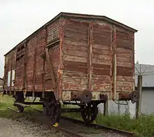 A cattle wagon used for the transport of Belgian Jews to camps in Eastern Europe. The openings were covered in barbed wire. This example is preserved at Fort Breendonk.