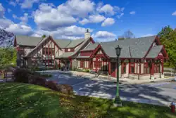 The two-story Tudor Revival library building