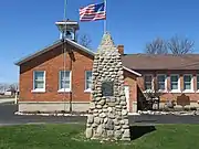 An obelisk, dedicated in 1928 to commemorate the school's centennial