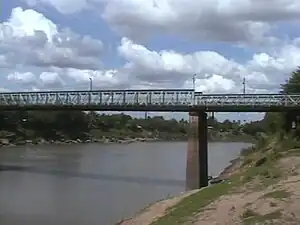 Photograph of a bridge spanning the Manimuktha River at Veerasolapuram.