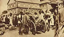 Image 1British West African Campaign troops in Freetown, 1914–1916. Published caption: "British expeditionary force preparing to embark at Freetown to attack the German Cameroons, the main object of the attack being the port of Duala. Auxiliary native troops were freely used in African warfare." (from Sierra Leone)