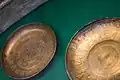 Two Phoenician bronze bowls from Nimrud on display in the British Museum