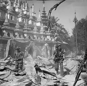 Image 35British soldiers on patrol in the ruins of the Burmese town of Bahe during the advance on Mandalay, January 1945. (from History of Myanmar)