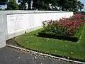 Retaining wall with the inscribednames of the missing.