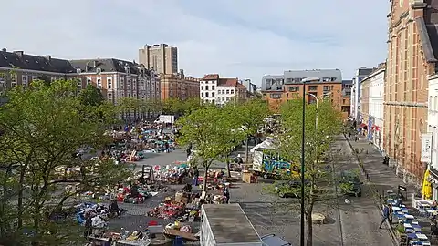 Panoramic view of the square with a flea market taking place