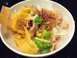 Bubur ayam, with additional toppings