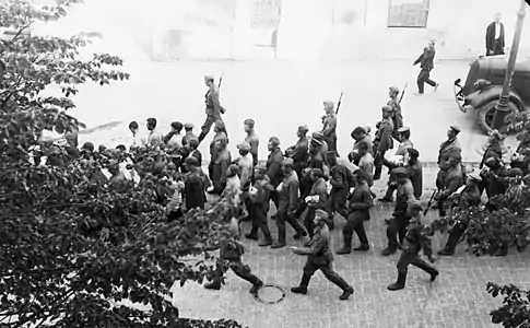 Soviet POWs escorted by German soldiers in Vilnius, June–July 1941