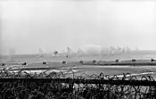 Shell splashes in the waters off Riva Bella (Sword Beach), May 30, 1944.