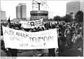 A protest takes place near the clock on 24 April 1990.