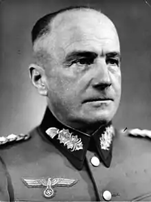 A man wearing a military uniform.