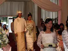 Image 34A wedding procession, with the groom and bride dressed in traditional Burmese wedding clothes, reminiscent of royal attire. (from Culture of Myanmar)