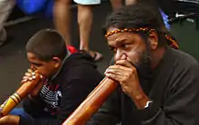 Image 38Didgeridoo performers (from Culture of Australia)