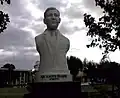 A statue of Governor Villavert in front of the provincial Capitol