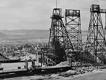 Image 23Mining headframes in Butte, MT (from History of Montana)