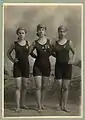 c. 1920: young women wearing swimming competition medals