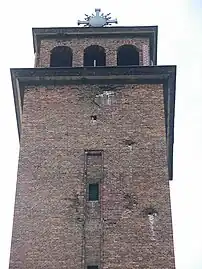 Detail of the steeple, still bearing some 1945 damages