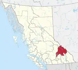 A map of British Columbia depicting its 29 regional districts and equivalent municipalities. One is highlighted in red.