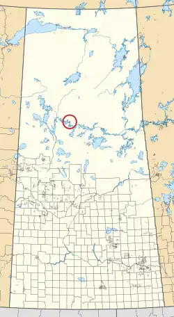 A map of the province of Saskatchewan showing 297 rural municipalities and hundreds of small Indian reserves. One is highlighted with a red circle.