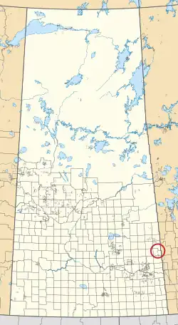 A map of the province of Saskatchewan showing 297 rural municipalities and hundreds of small Indian reserves. One is highlighted with a red circle.