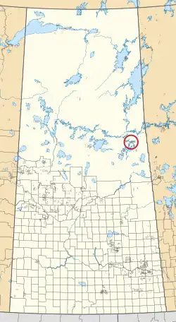 A map of the province of Saskatchewan showing 297 rural municipalities and hundreds of small Indian reserves. One is highlighted with a red circle.