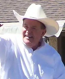 Roy Ashburn riding in the annual Bishop Mule Days parade