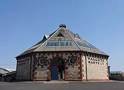 An octagonal cattle market building