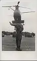 A Marine signals a CH-46 into position for a resupply hook-up at Hill 55