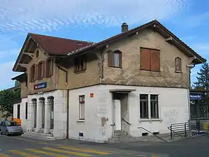 Two-story building with gabled roof